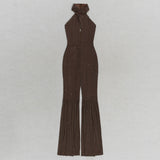 HALTER NECK BACKLESS FLARE LEG JUMPSUIT IN BROWN