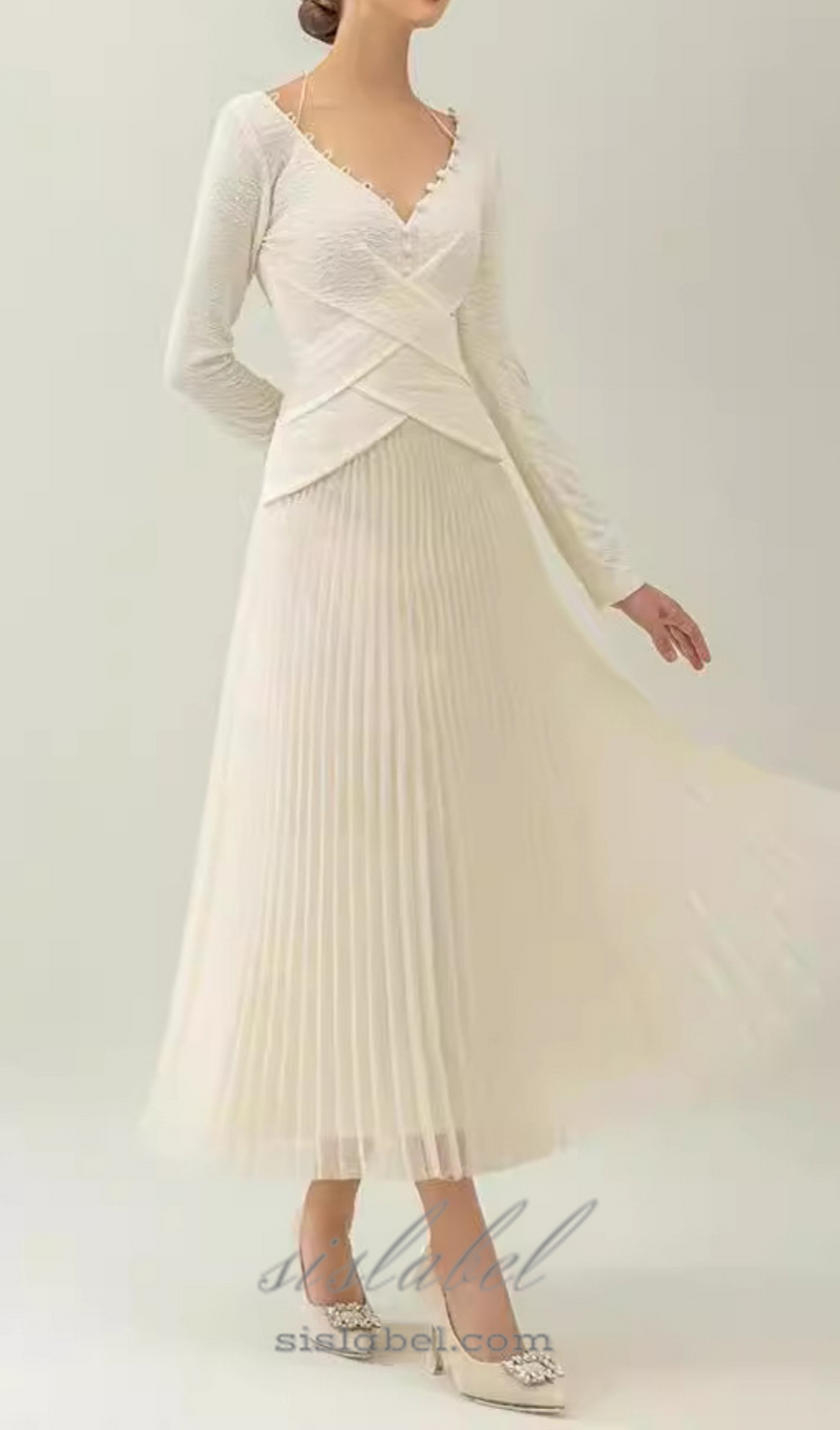 V NECK PLEATED MAXI DRESS IN IVORY