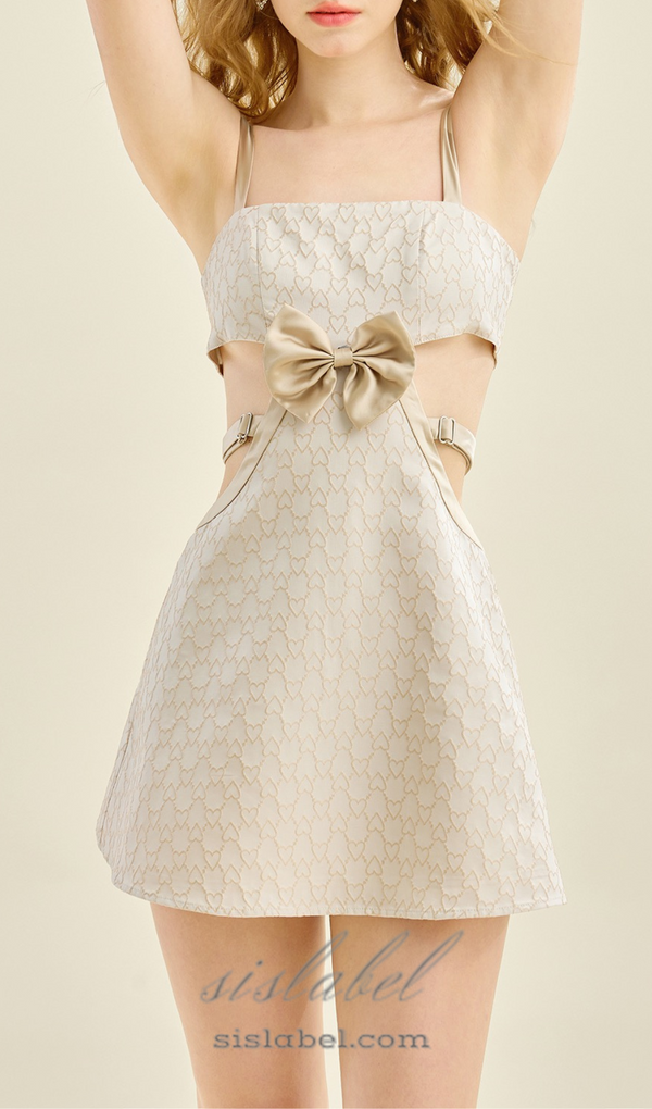 BOW EMBELLISHED CUTOUT MINI DRESS IN APRICOT