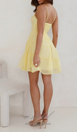 calista strap mini dress in yellow