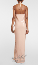 ADELAIDE ROSETTE HALTER SEQUINED GOWN IN CHAMPAGNE