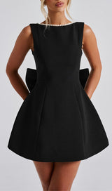 TRISTA BOWKNOT PEARL BACKLESS MINI DRESS IN BLACK