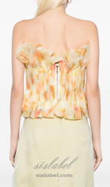 print ruffle trim top in yellow