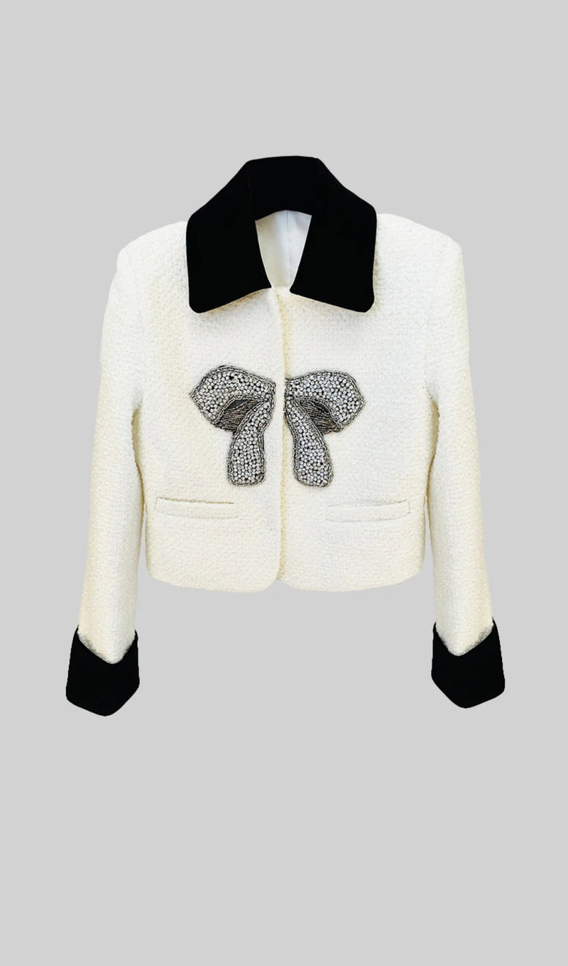 TWEED BLAZER WITH CONTRASTING ELEMENTS AND METALLIC BOW ACCENT