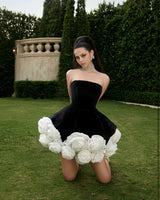 flower-embellished-hem black strapless mini dress