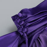 satin wrap halter gown with flower in purple