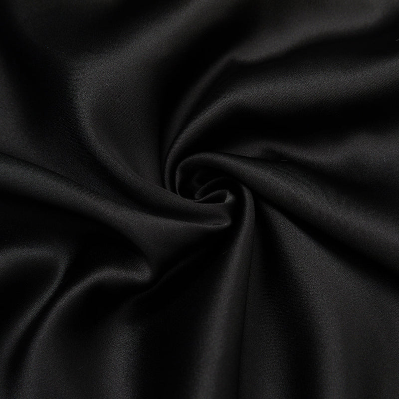 MIDIKLEID MIT RÜSCHEN IN SCHWARZ 