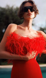 STRETCH STRAPLESS FEATHER TRIMMED GOWN IN RED