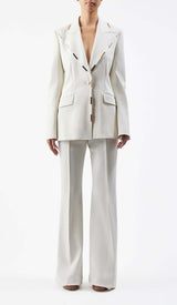 HIGH-RISE FLARED JACKET SUIT IN IVORY