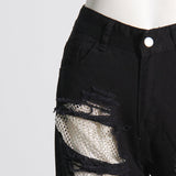 PANTALON EN JEAN PATCHWORK EN MAILLE DIAMANT