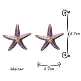 STARFISH EARRINGS IN PURPLE